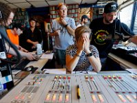 Surrounded by current and former DJ's, WUMD station manager, Jennifer Mulcare-Sullivan, is overcome with emotion as she signs off for the last time over the air as the station transitions to an online only broadcast.  The University of Massachusetts Dartmouth radio station, WUMD, stopped broadcasting over the airwaves after 42 continuous years.   It will now continue to broadcast strictly over the internet at www.umd.rocks   [ PETER PEREIRA/THE STANDARD-TIMES/SCMG ]